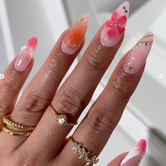 Whimsical Floral Long Stiletto Pink Press On Nail Set with Charming Flower Accents