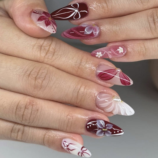 Elegant Floral Charm Long Stiletto Burgundy with Intricate Nail Art