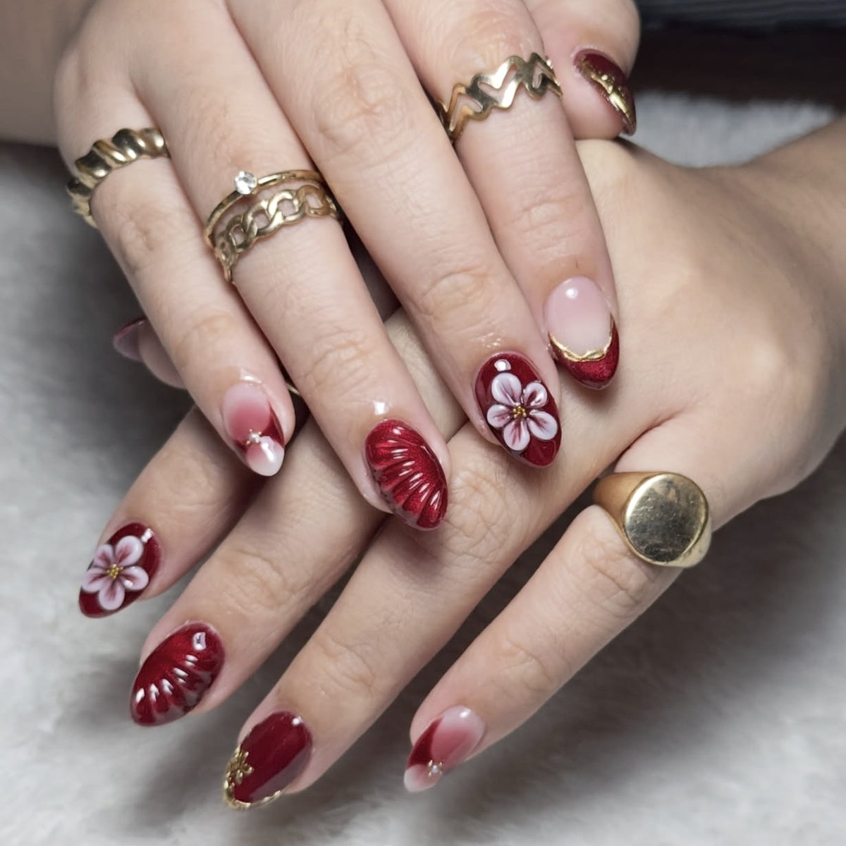 Elegant Floral Short Almond Red Nail Set with Unique Textured Design