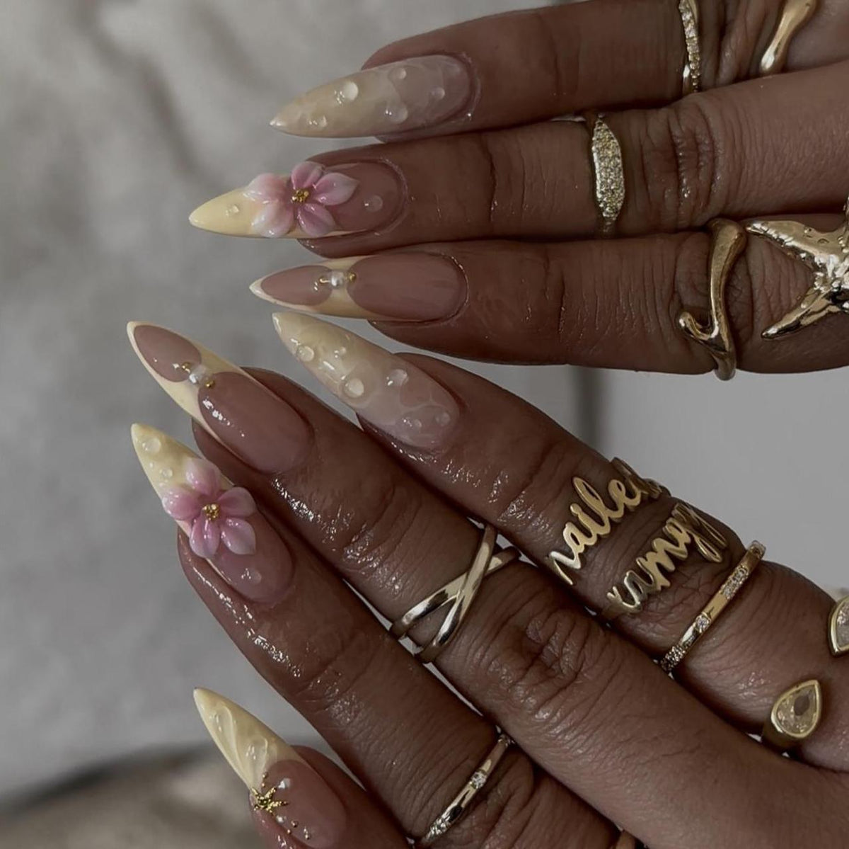 Elegant Blossom Long Stiletto Almond Shape with Floral Accent and Pearl Details