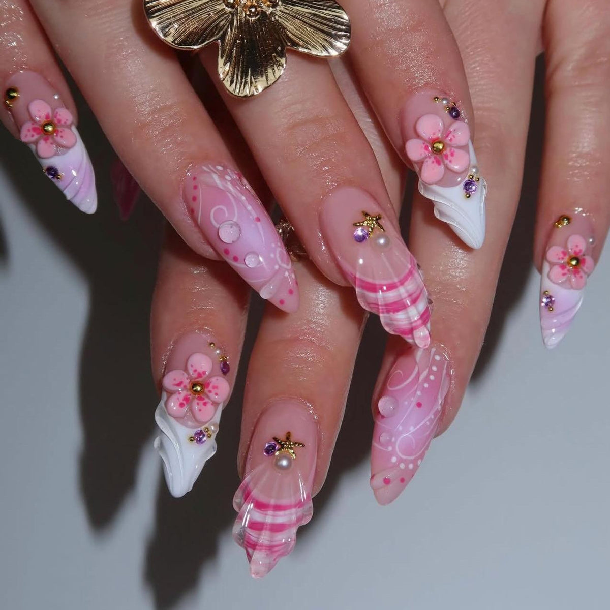 Dreamy Floral Medium Stiletto Pink Nail Set with Charming Decorative Accents