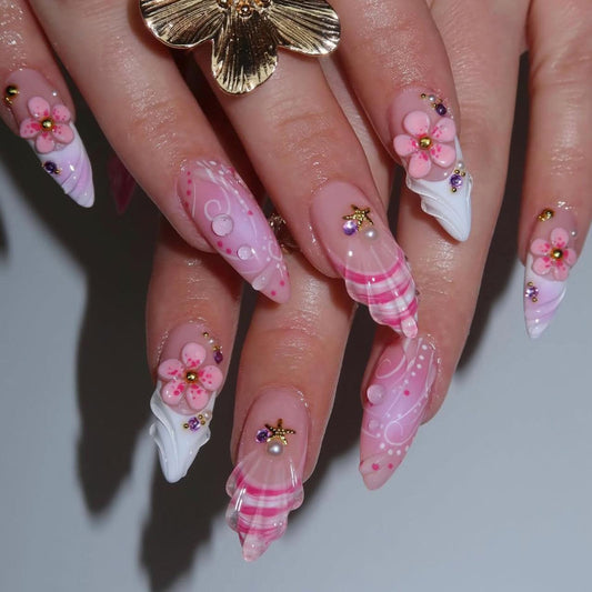 Dreamy Floral Medium Stiletto Pink Nail Set with Charming Decorative Accents