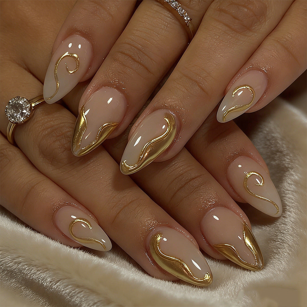 Elegant Glow Long Almond Shaped Beige Press On Nail Set with Gold Swirl Detail
