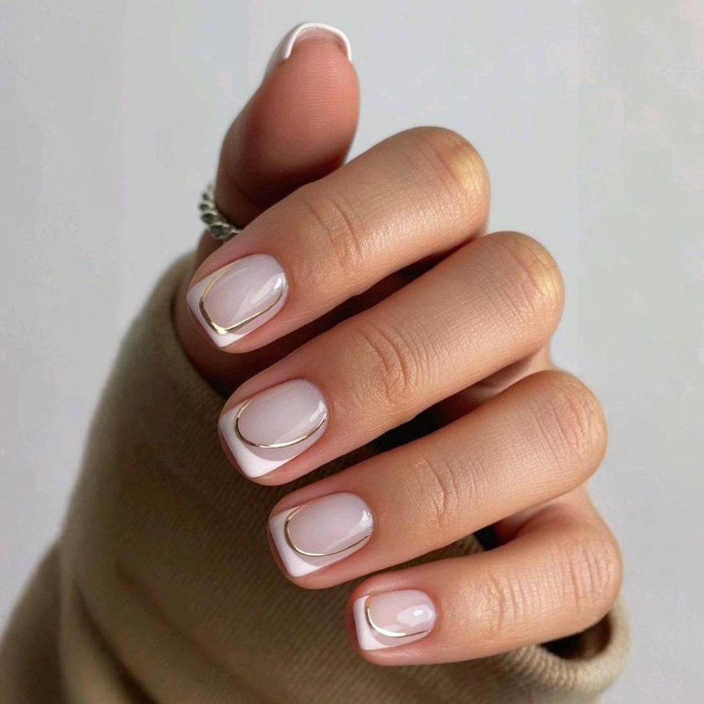 Elegant Ivory Short Square Nails with Gold Accent Design