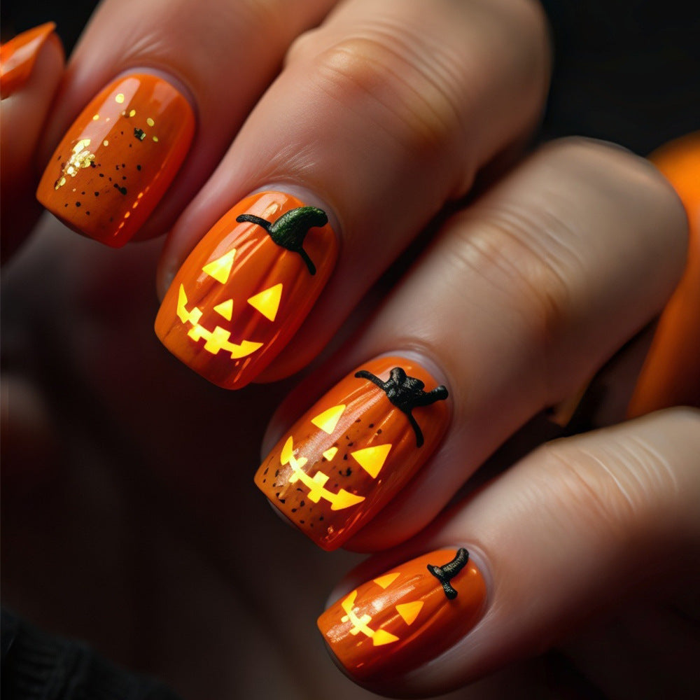 Spooky Halloween Short Square Orange Nails with Glow-in-the-Dark Jack-o-Lantern Design