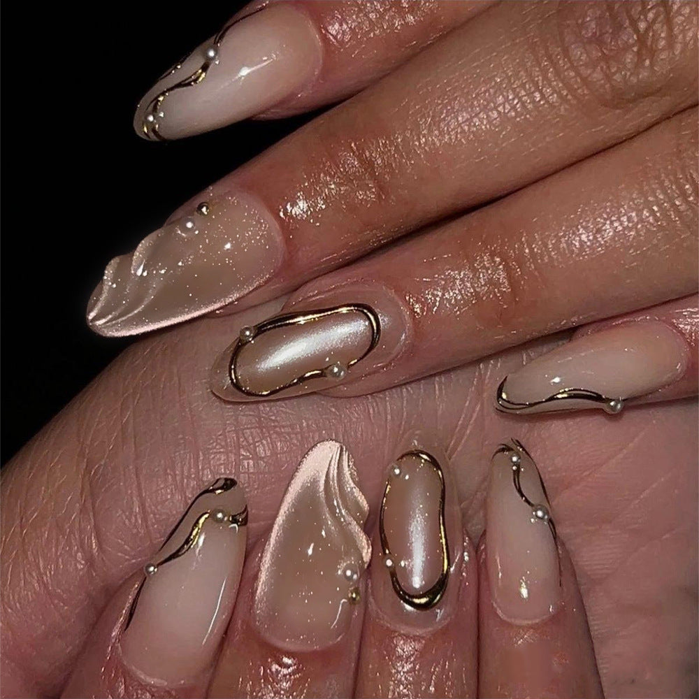 Glamorous Elegance Long Almond Shaped Beige Press On Nail Set with Stunning Gold Trim Design