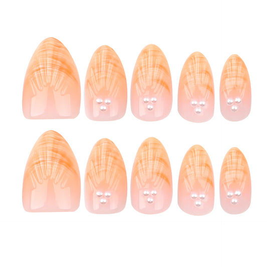 Set of orange and pink gradient nail art designs on a white background