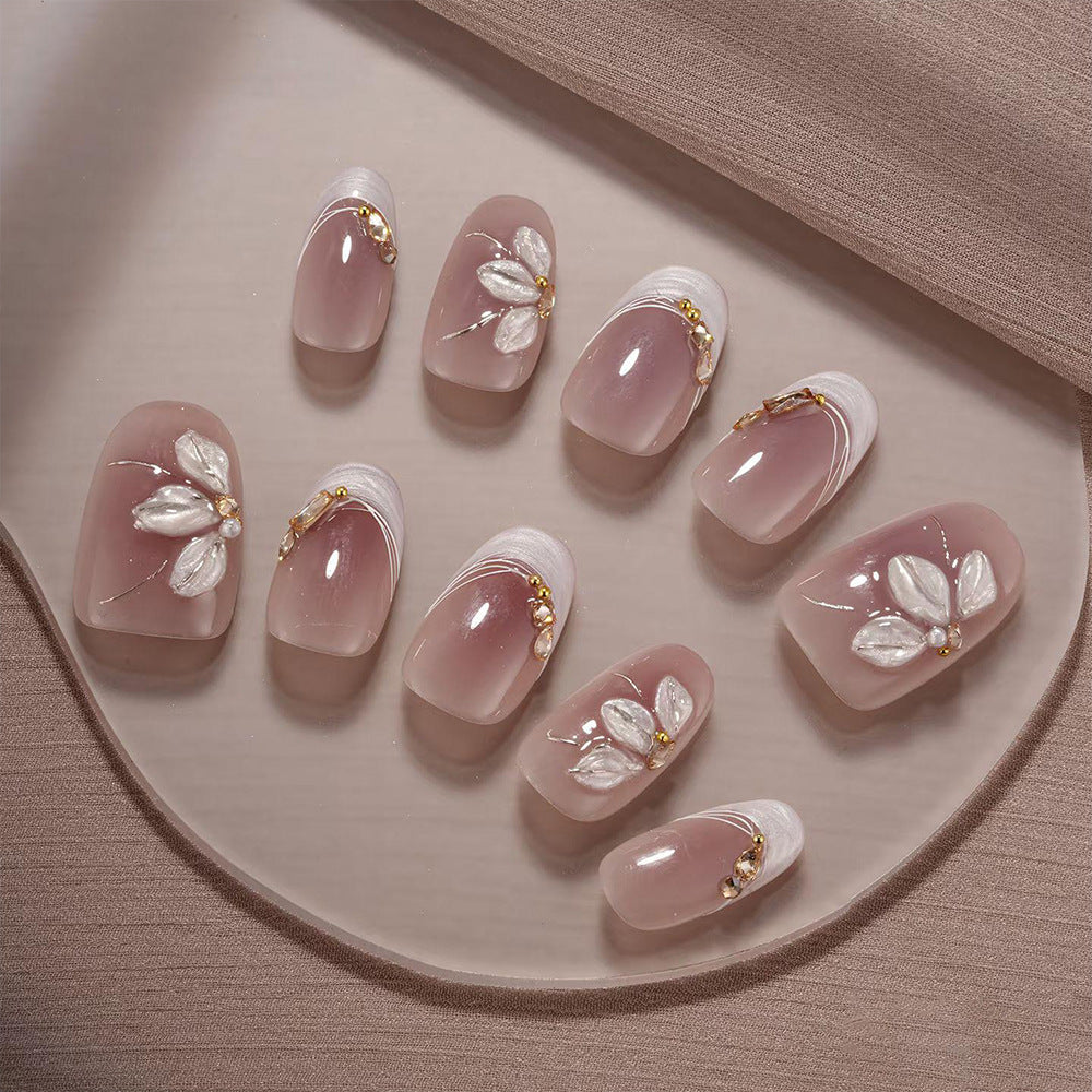 Floral Elegance Short Almond Blush Nails with Delicate Flower Accents