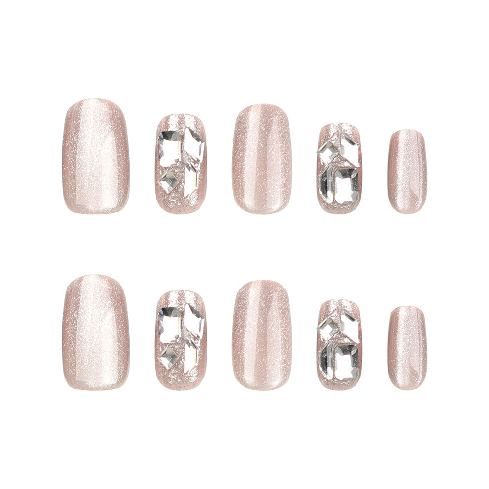 Sparkling Elegance Medium Squoval Soft Pink Glitter Nails with Rhinestone Accent
