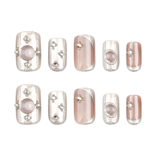 Glamorous Elegance Glossy Medium Squoval Beige Nails with Shimmering Accents and Sparkling Gems