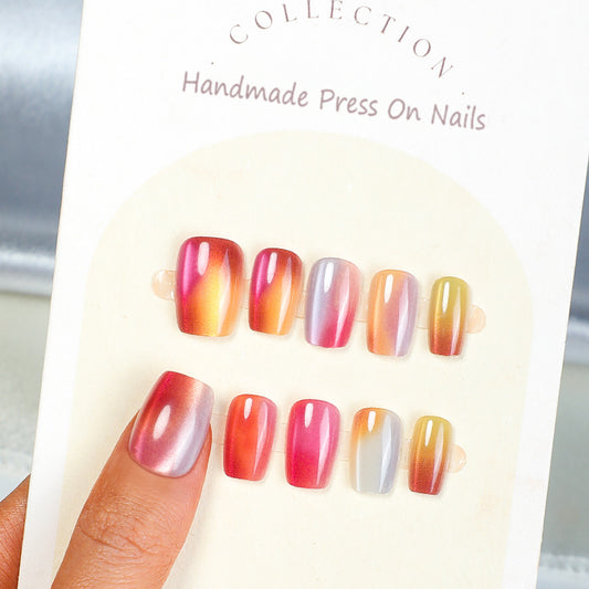 Set of gradient press-on nails on a display card with 'Collection' branding.