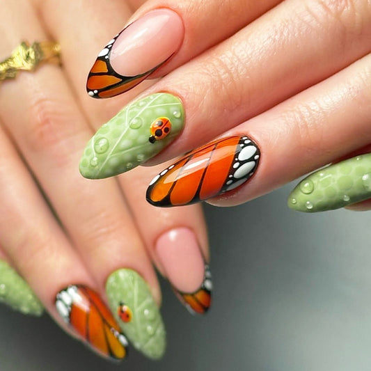 Butterfly Garden Long Almond Press On Nail Set Green and Orange with Ladybug Accent for a Nature Inspired Look