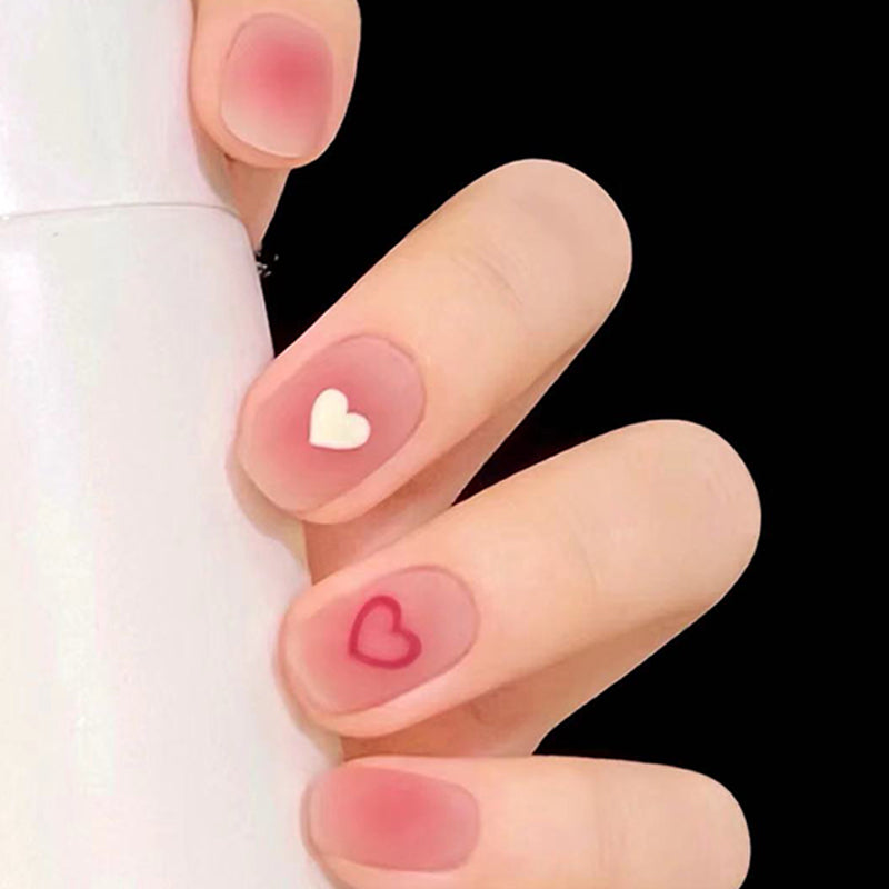 Romantic Affair Medium Oval Beige Press On Nails with Love Heart Accents