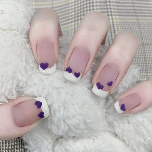 Enchanting Love Affair Medium Length Square Tip Press-On Nails in beige with White Tips and Purple Heart Accents