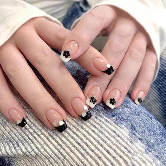 Chic Floral Elegance Long Coffin Black and White Press On Nails with Delicate Flower Accents