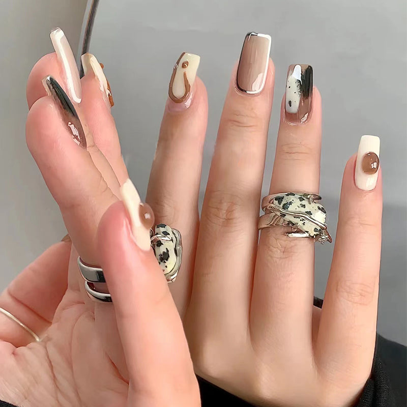 Fashion Forward Long Square Beige Press On Nail Set with Abstract Black and White Accents