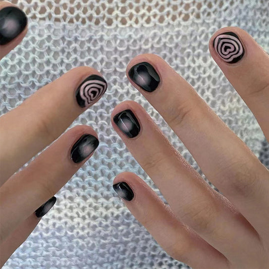 Mystic Swirls Short Length Oval Black Press On Nail Set with Accent Spiral Design