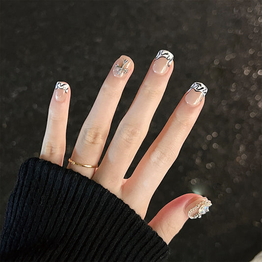 Elegant Floral Fantasy Short Square Beige Press On Nails with Black Swirl Accents