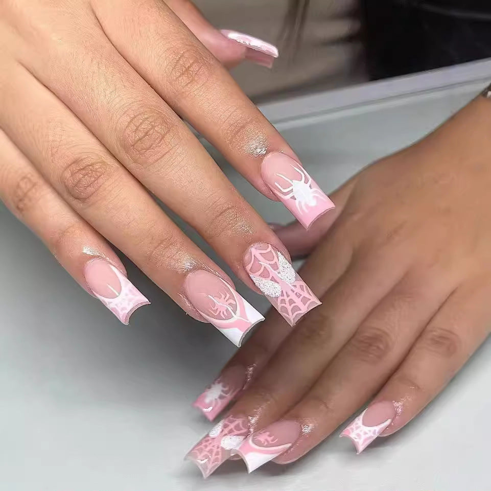 Spooky Elegance Long Square Pink Press On Nails With Spiderweb Design And Glitter Accents
