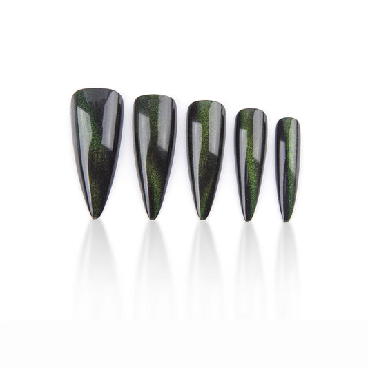 A set of long, dark green, iridescent, stiletto-style press-on nails.