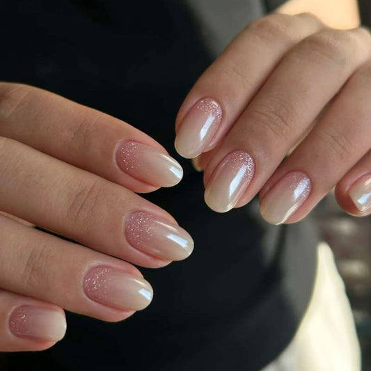 Whimsical Elegance Medium Squoval Shaped Soft Pink Press On Nail Set with Sparkling Tips