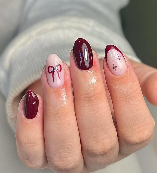 Charming Elegance Medium Almond Burgundy and Soft Pink Nail Set with Dazzling Bow and Crystal Accents