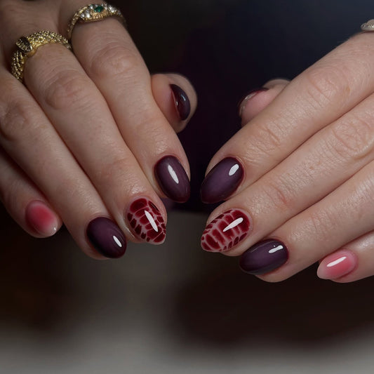 Gothic Glamour Medium Almond Shaped Deep Purple and Burgundy Press On Nail Set with Unique Animal Print Accent Design