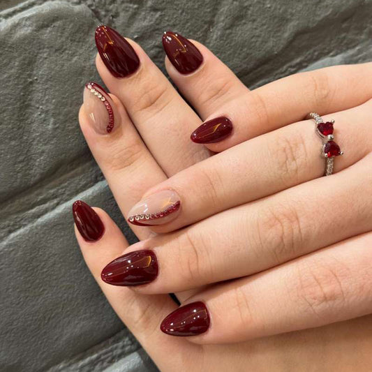 Glamorous Elegance Long Almond Burgundy Press On Nail Set with Eye-Catching Gem Accents