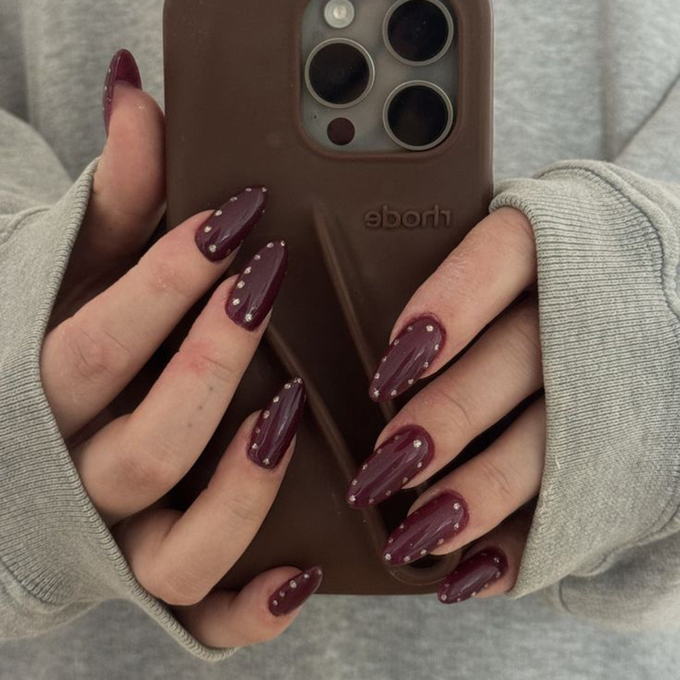 Glamorous Elegance Long Almond Shaped Deep Burgundy Press On Nail Set with Dazzling Rhinestone Accents