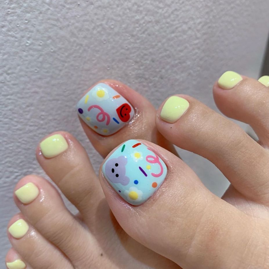 Whimsical Wonderland Short Square Pastel Yellow and Playful Patterned Toenail Press Set