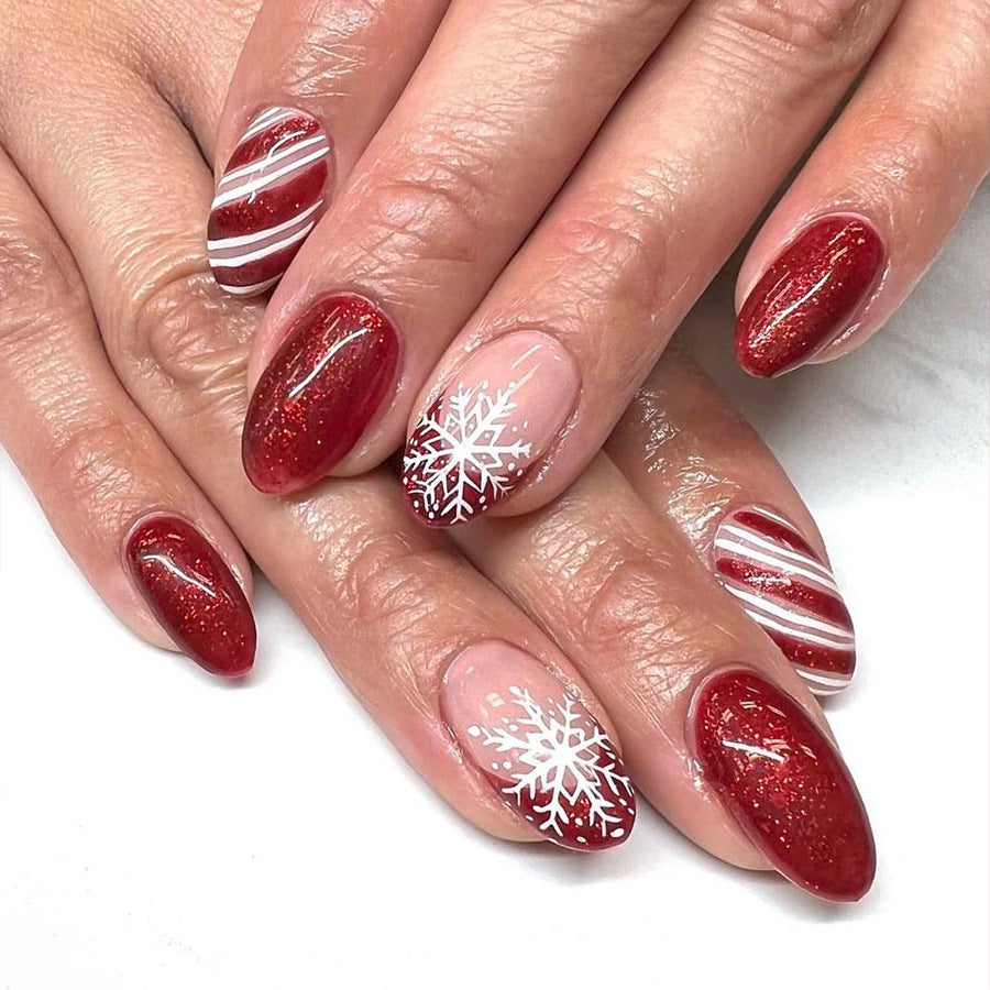 Winter Wonderland Medium Almond Red Glittery Press On Nail Set with Snowflake and Candy Cane Design