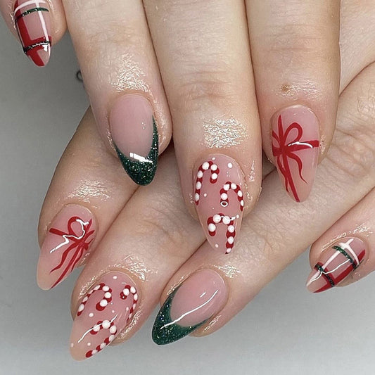 Holiday Cheer Long Almond Shape Beige Press On Nails with Red and Green Candy Cane and Bow Accents