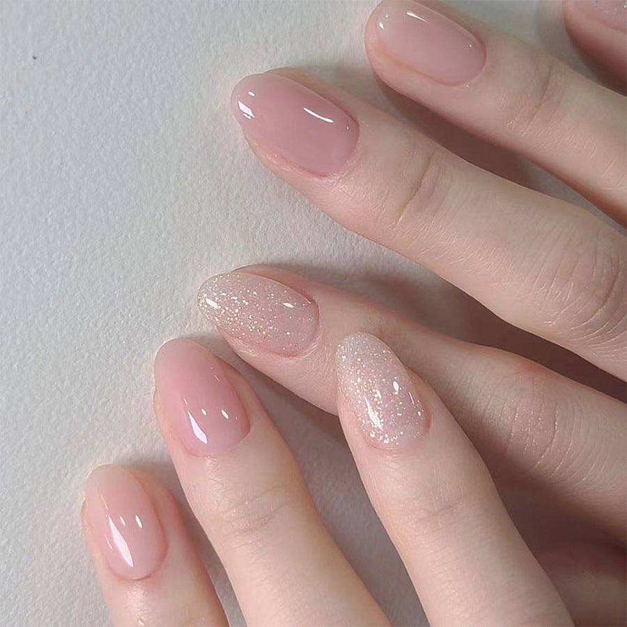 Glistening Elegance Medium Oval Natural Pink Press On Nail Set with Glitter Accent Finish