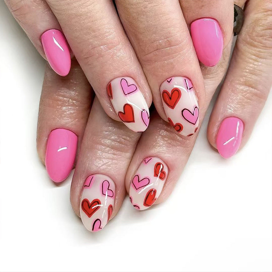 Whimsical Heartbeat Medium Oval Pink Press-On Nail Set with Playful Heart Patterns