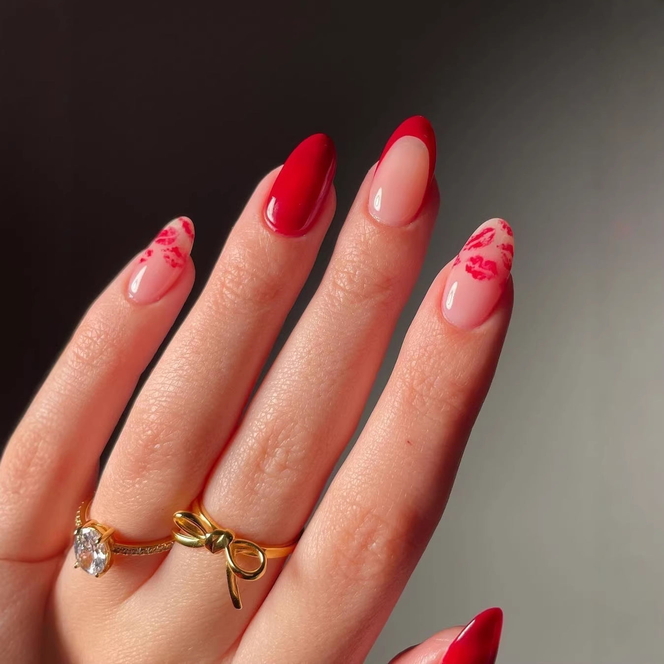 Romantic Kiss Inspired Medium Almond Shaped Red and Beige Nail Set with Charming Lip Print Detail