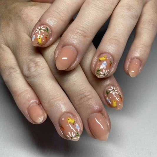 Whimsical Blossom Short Almond Peach Press On Nail Set with Floral Design