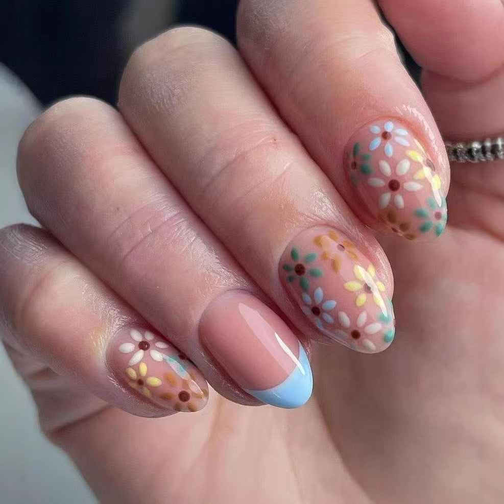 Garden Bliss Medium Oval Floral Press On Nail Set in Soft Pink with Vibrant Flower Design