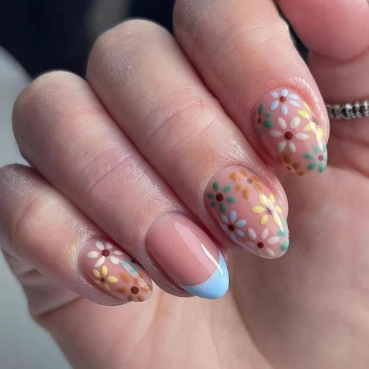 Garden Bliss Medium Oval Floral Press On Nail Set in Soft Pink with Vibrant Flower Design