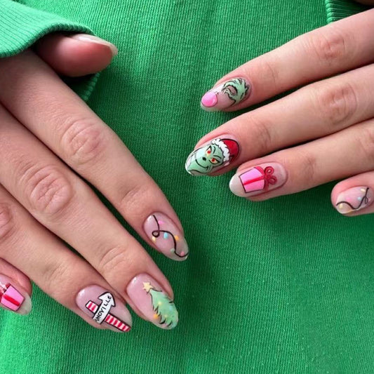 Whimsical Holiday Press On Nail Set Medium Almond Green with Festive Character Designs