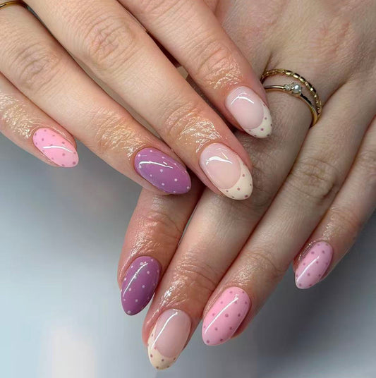 Charming Whimsy Medium Oval Shaped Long Pink Purple and Beige Press-On Nail Set with Playful Polka Dots