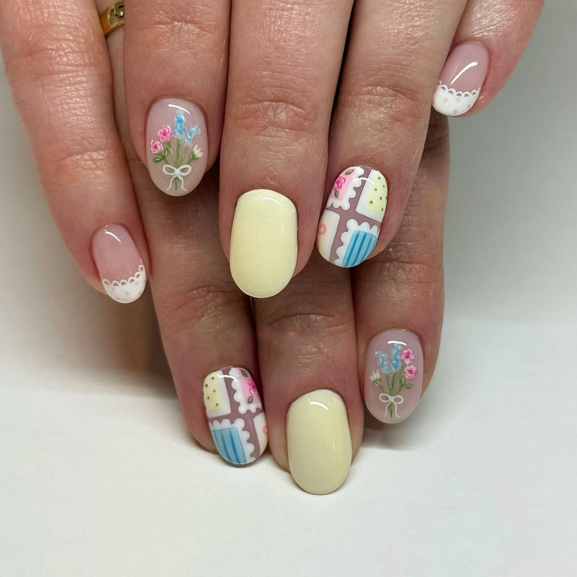 Blooming Garden Press On Nail Set Medium Oval Pastel Yellow with Floral Designs
