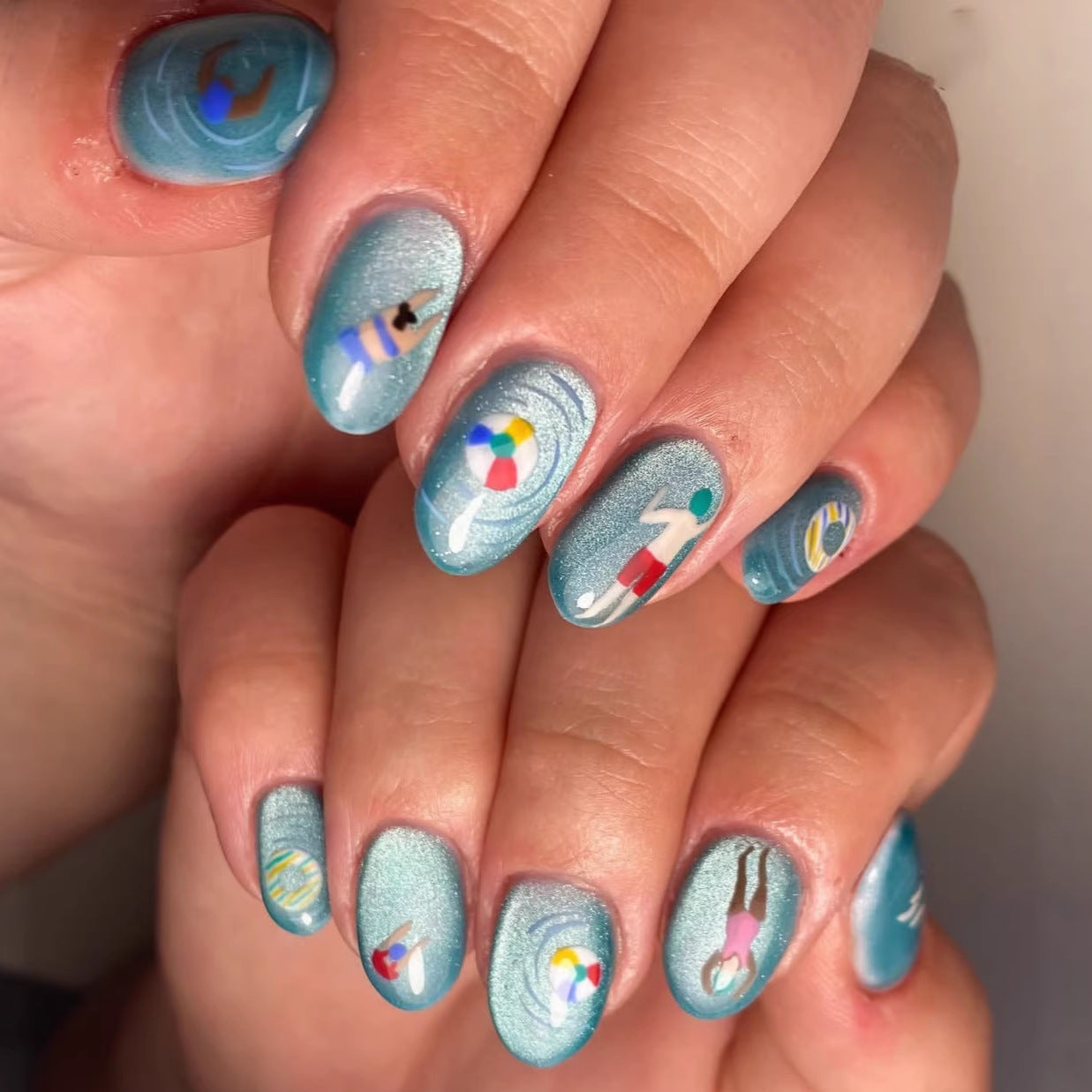 Tropical Paradise Medium Oval Aqua Press On Nail Set Featuring Unique Beach-Themed Designs