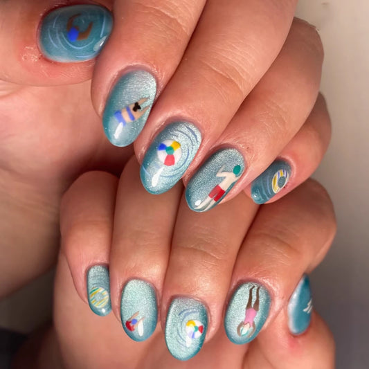 Tropical Paradise Medium Oval Aqua Press On Nail Set Featuring Unique Beach-Themed Designs