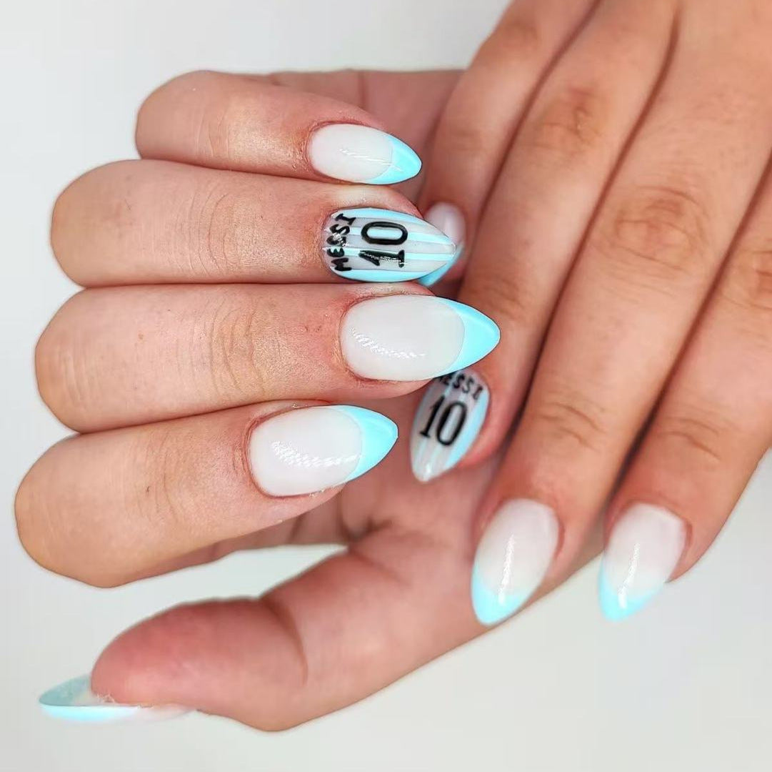 Charming Ocean Breeze Elegant Medium Almond Shape Glossy Light Blue Accent Nail Set with Unique Graphic Design