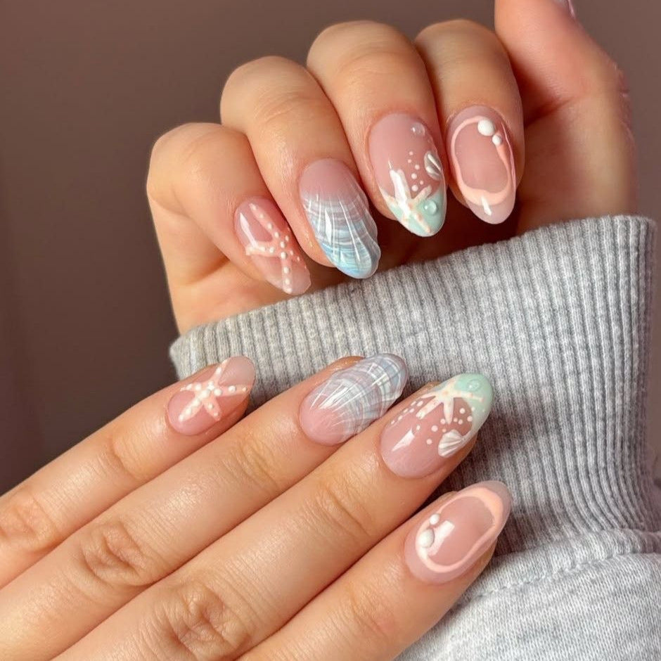 Ocean Breeze Medium Almond Pastel Nail Set with Unique Artistic Accents