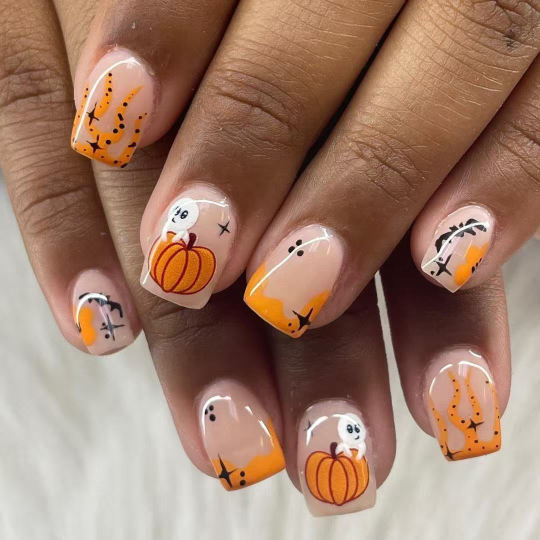 Spooky Short Square Orange Halloween Themed Press On Nail Set with Pumpkin and Ghost Patterns