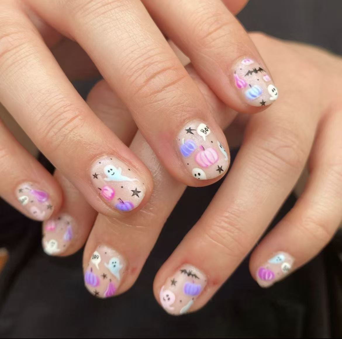 Spooky Short Round Pastel Nail Set with Whimsical Halloween Designs