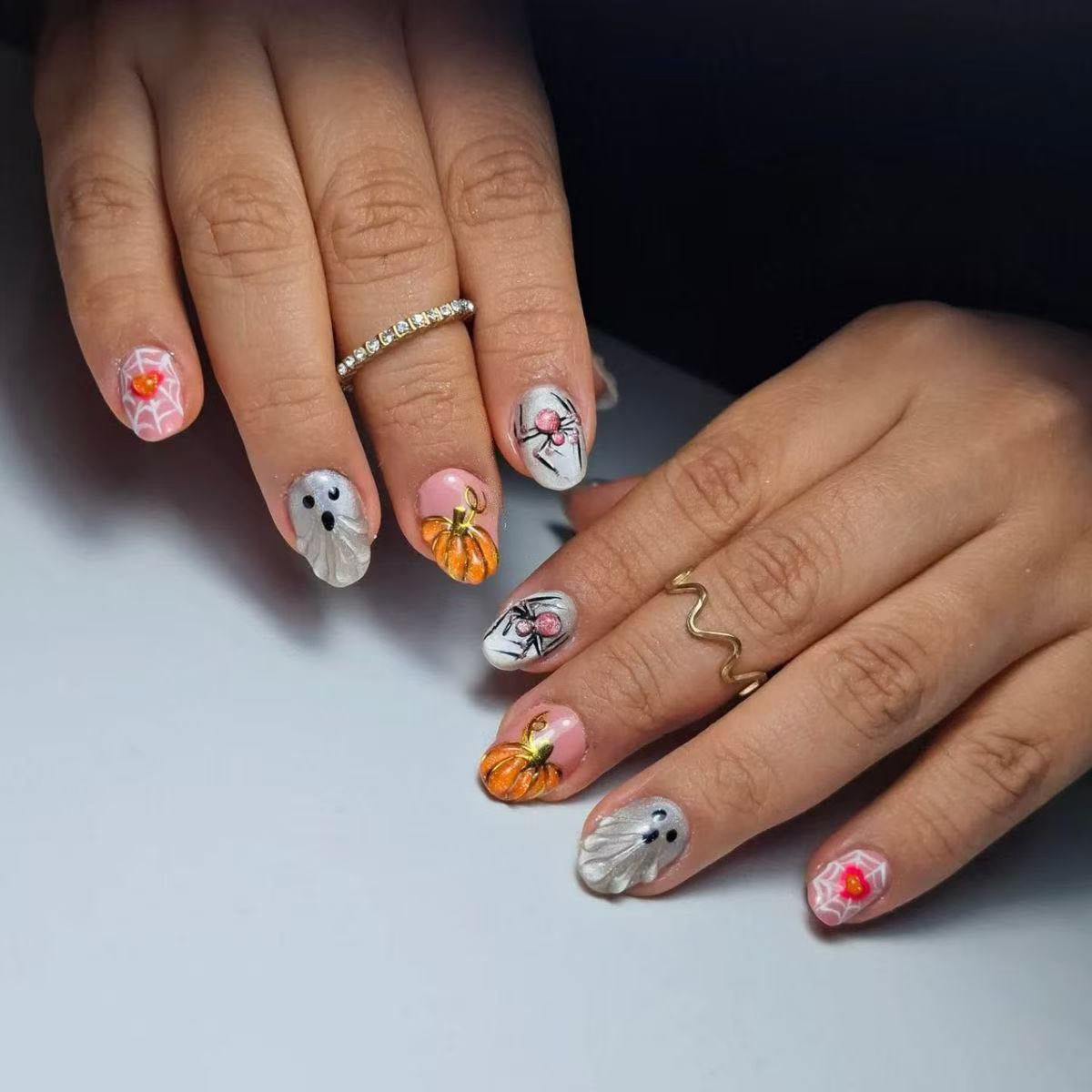 Spooky Festival Short Oval Pink and Silver Nail Set with Intricate Halloween Designs