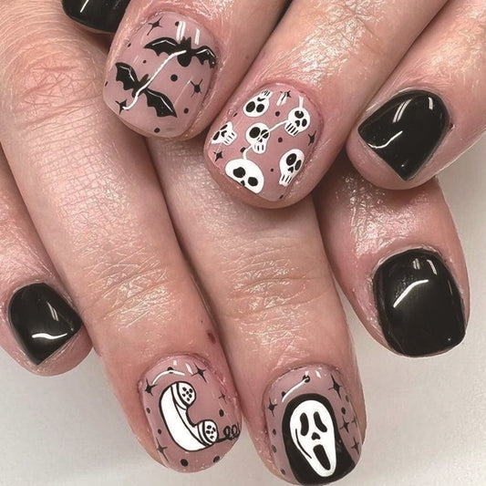 Spooky Elegance Short Oval Black and Pink Press On Nail Set with Halloween Motifs