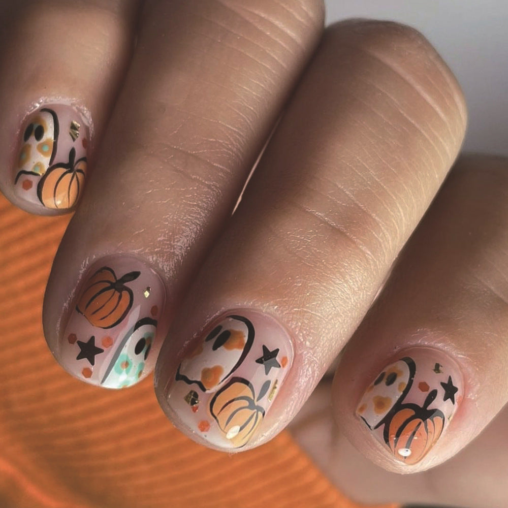 Autumn Elegance Short Length Oval Press On Nail Set in Translucent Orange with Pumpkin Accents and Rhinestone Embellishments